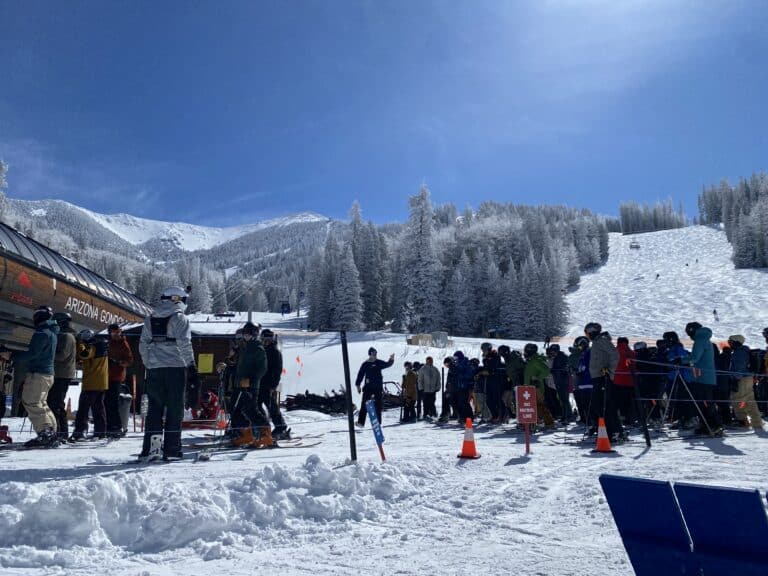 Skiers and snowboarders gathered at the base of Arizona Snowbowl on opening day