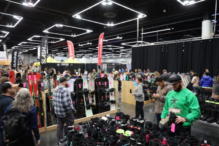 Shoppers browsing skis, snowboards and winter gear at the Flagstaff Ski & Snowboard Swap